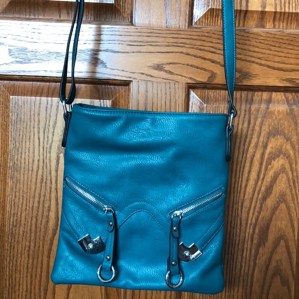 Maurice’s cross body turquoise bag